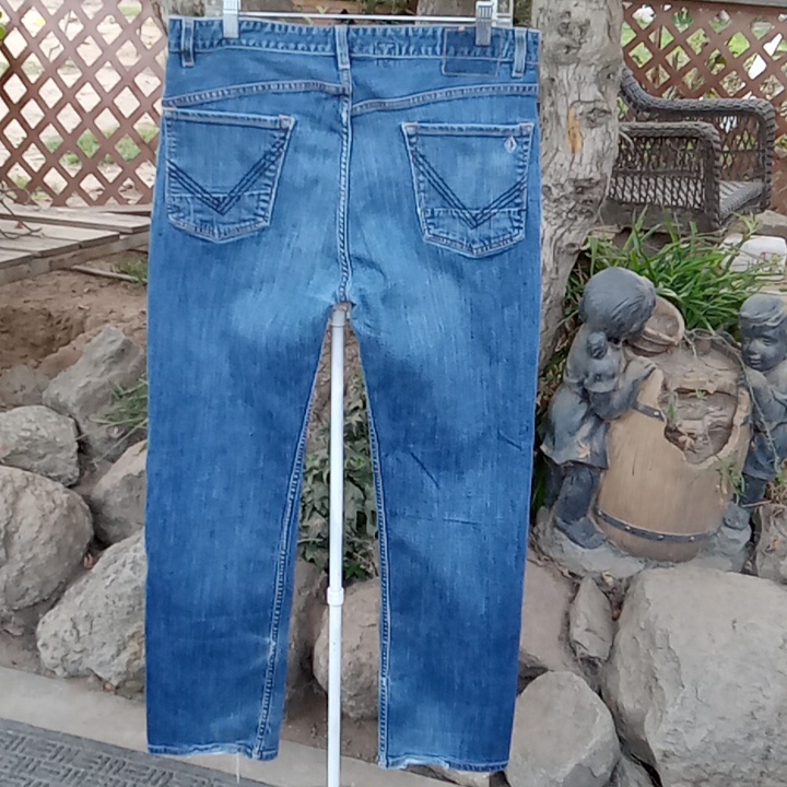 Men's Jeans Distressed Size 34. Leg Inseam 30 Inches.